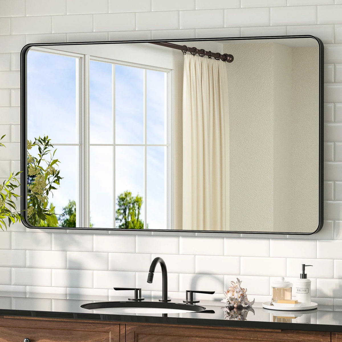 Black framed bathroom mirror for a modern bathroom